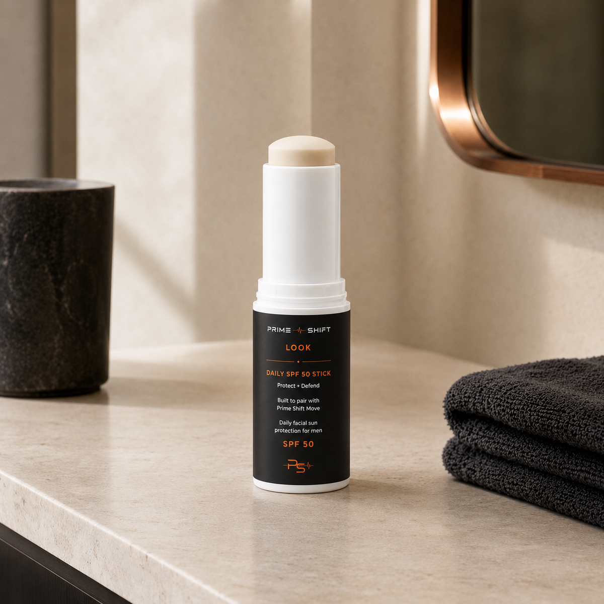 Prime Shift Look Daily SPF 50 Stick in a warm premium bathroom setting